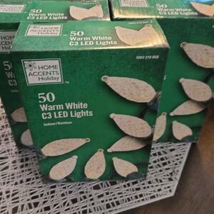 2 Boxes 50 C3 warm white Christmas lights.
